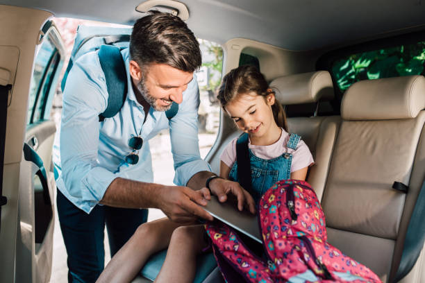 istock Father prepares the girl for school 1363869844