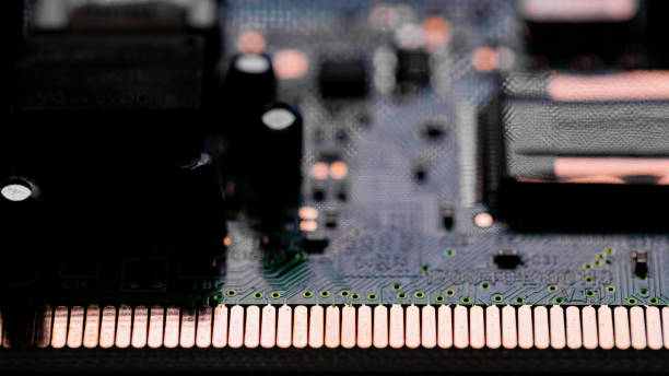 istock Close up of components and microchips on PC circuit board 1363870906