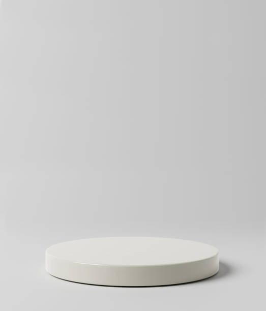 istock Simple white podium on gray background. Product presentation mock up. 1363875046