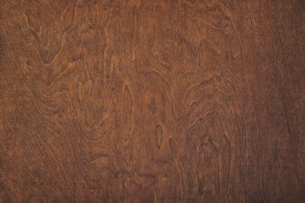 istock brown boards as a template for design. dark wood texture backdrop 1363875304