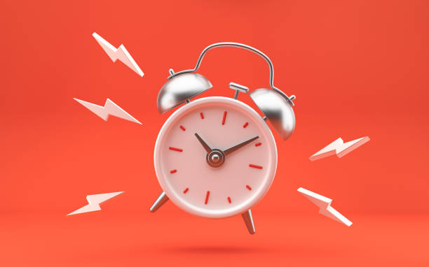 istock White and silver metal vintage ringing alarm clock on bright red background. Modern design, 3d rendering. 1363876523