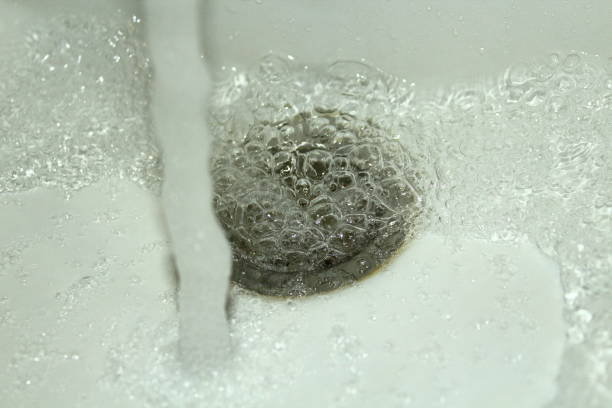 istock Water jet in the sink. Close-up. Background. 1363879104