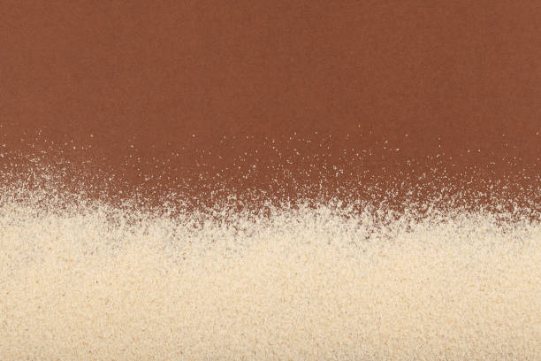 istock Baking background with copy space, almond flour on brown textured surface. Top view, space for your text 1363880203