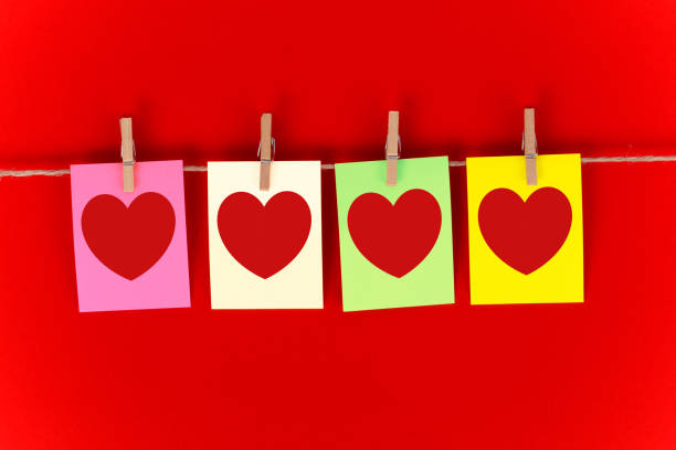 istock Valentine's Day concept. heart shapes on red background. 1363884897
