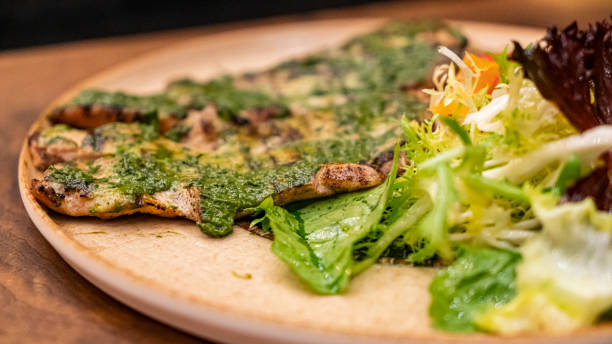 istock Chicken and pesto sauce 1363887065
