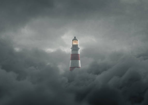 istock 3d rendering of an illuminated lighthouse over fluffy darken clouds 1363888696