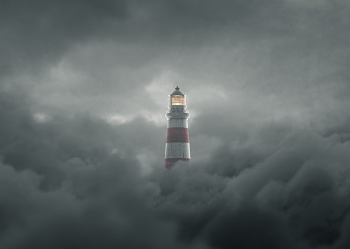 3d rendering of an illuminated lighthouse over fluffy darken clouds