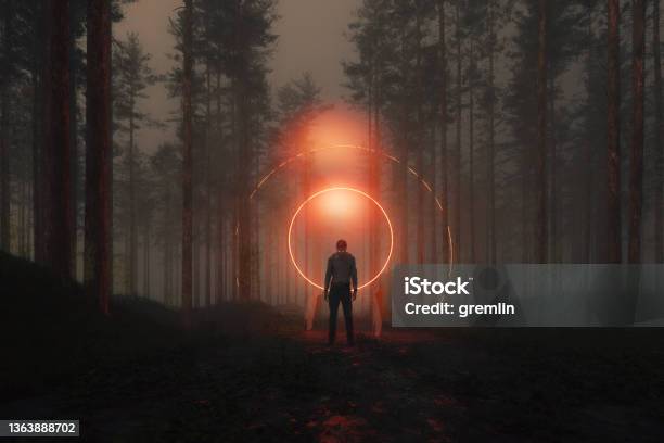 Inert Zombie Standing In The Forest At Night Stock Photo - Download Image Now - Circle, Fantasy, Digitally Generated Image