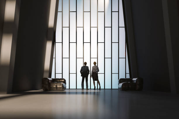Business colleagues talking in secrecy