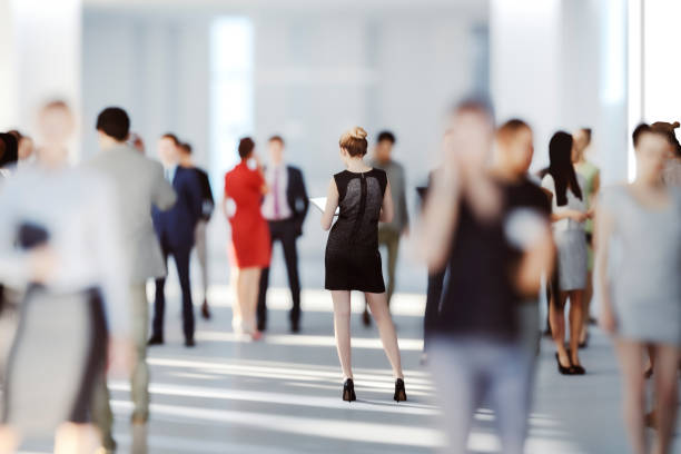 istock Business people in office building lobby 1363888772