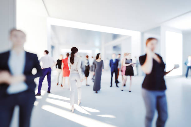 istock Business people in office building lobby 1363888787