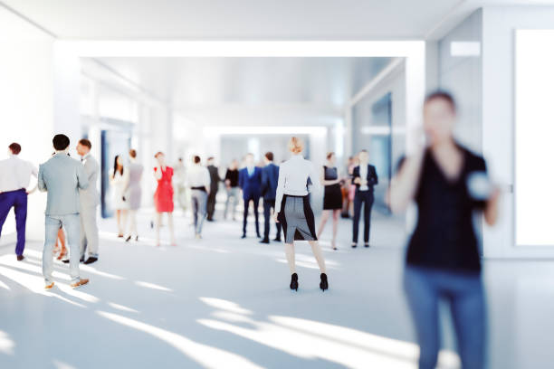 istock Business people in office building lobby 1363888791