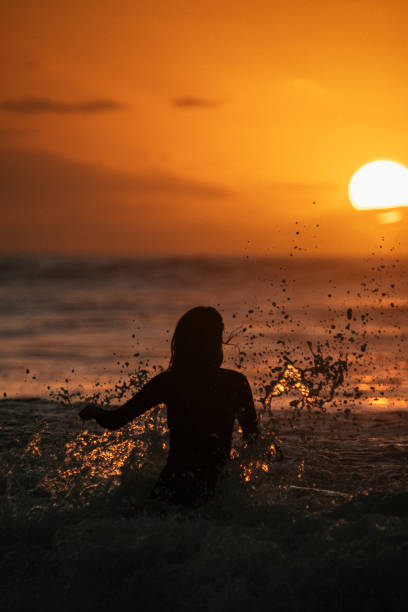 Free Stock Photo of Woman in Ocean during Sunset | Download Free Images ...