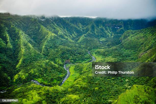 Aerial View From Helicopter Of River Flowing Through Lush Tropical Landscape Stock Photo - Download Image Now