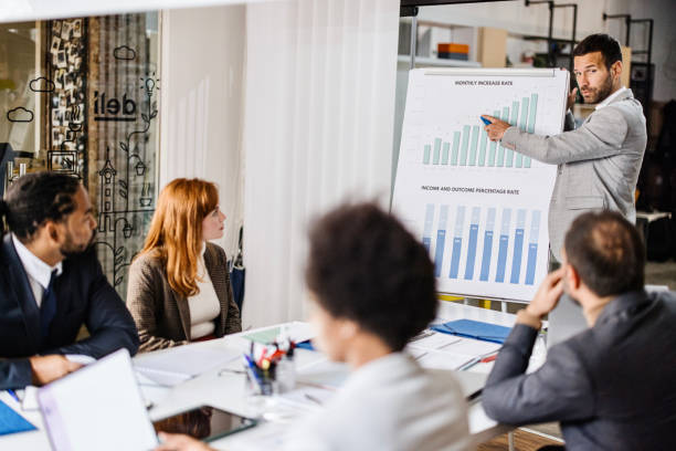 istock Confident business man leader lecturing his employees in office 1363891531