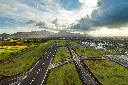 Aerial view of airport tarmac in Hawaii at sunset
