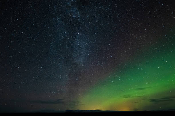 istock Milky Way, Shooting Star and the Aurora Borealis 1363893587