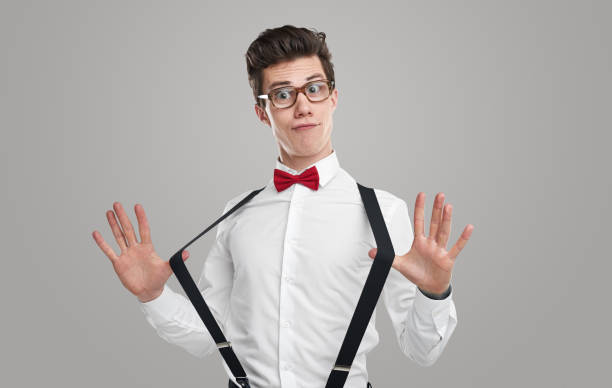 istock Confident young student stretching suspenders 1363894478