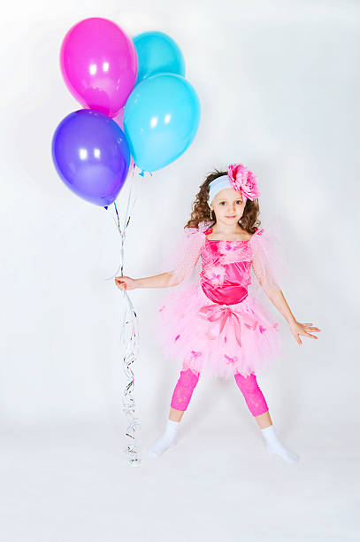 istock The girl with balloons 136389575