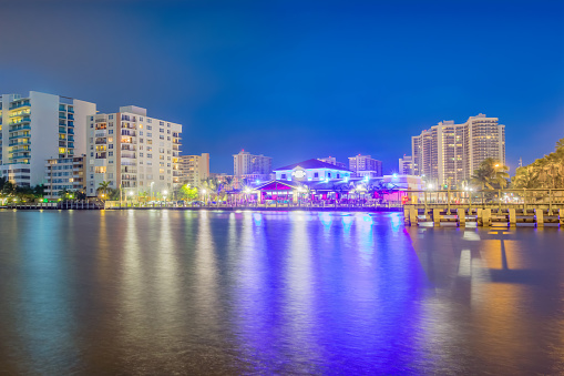 Waterfront hotels, condos and restaurant in Fort Lauderdale Florida USA illuminated at night