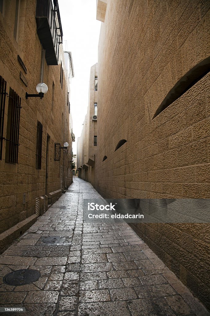 Jewish Quarter Alley A long and narrow allwey in the Jewish Quarter of the old city of Jerusalem. Alley Stock Photo