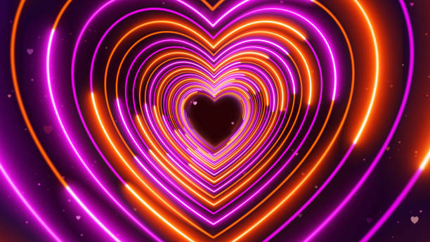 istock Abstract Romantic Sweet Purple Orange Heart Shape Lines Neon Light Tunnel With Glitter Heart Particles 1363903663