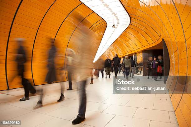 People Passing By On Modern Orange Subway Stock Photo - Download Image Now - Orange Color, Munich, Business