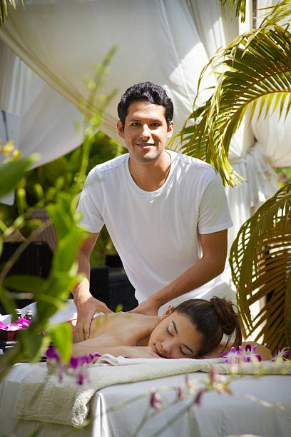 istock Masseur at work massaging woman in luxury spa 136390648