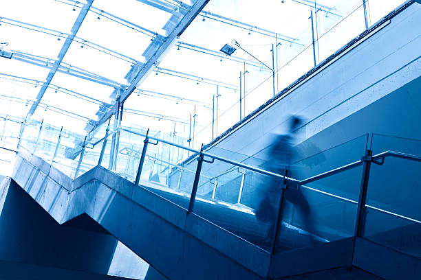 istock commuter in front of modern office lobby 136390870