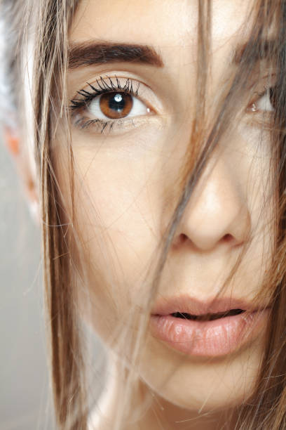 istock Beautiful brunette girl studio portrait. Serious face expression. 1363911238