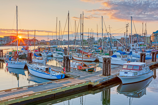 Fishing boats at sunrise docked in Provincial capital city of Victoria  on Vancouver Island, British Columbia