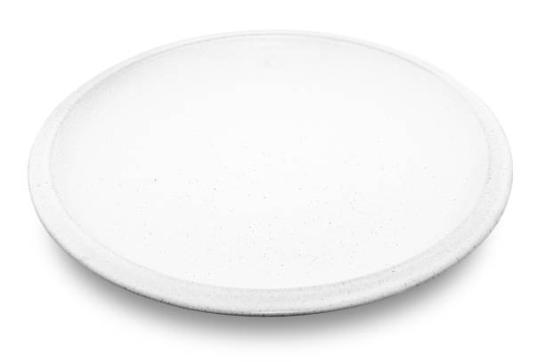 istock White circle ceramics plate isolated on white background. 1363914566