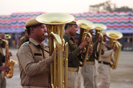 Police personnel practicing with saxophones    during Republic day parade practice session at Khanapara Field, Guwahati, Assam