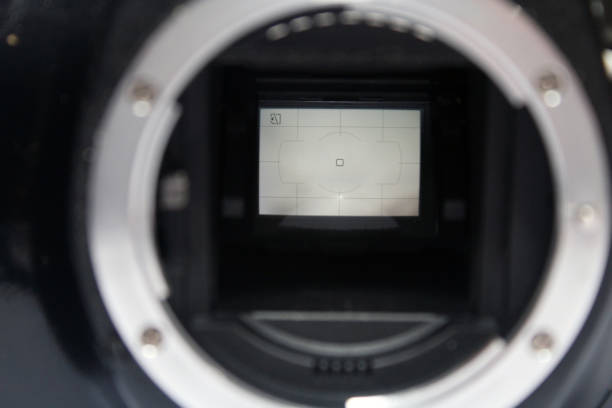 istock a dslr digital camera without body cap showing the mirror and camera sensor, defocused open old dslr digital photography and videography camera 1363932407