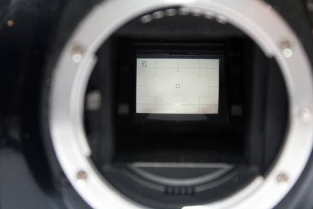 istock a dslr digital camera without body cap showing the mirror and camera sensor, defocused open old dslr digital photography and videography camera 1363932408