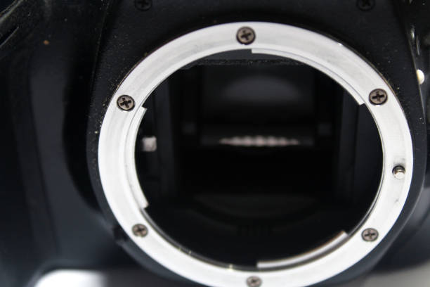 istock a dslr digital camera without body cap showing the mirror and camera sensor, defocused open old dslr digital photography and videography camera 1363932427