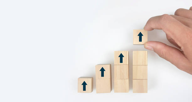 istock Wooden blocks chart steps with copy space. The business growth process 1363933008