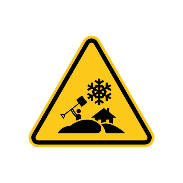 Heavy snowfall warning sign. Triangle warning sign. Vector illustration. Heavy snowfall warning sign. There is the figure of a person with a shovel in the snowdrift, snowflake, and a house symbol. weather warning sign stock illustrations