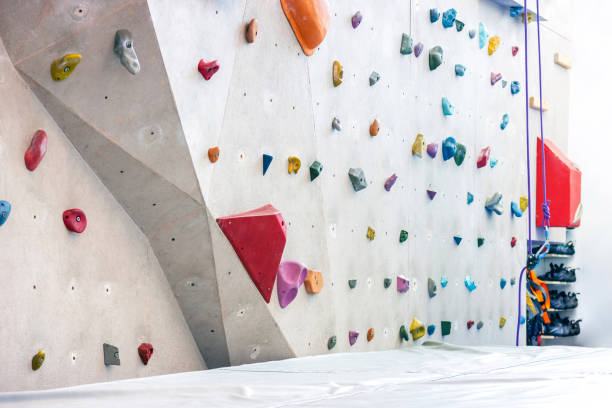 istock Indoor rock climbing simulation wall for mountaineering or mountain climber training 1363939113