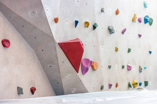 istock Indoor rock climbing simulation wall for mountaineering or mountain climber training 1363939114