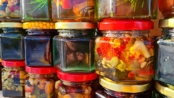 istock Jars of different honey varieties stocked on a shelf. 1363939804