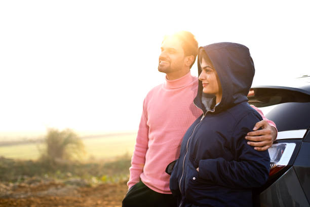 istock Couple admiring view at field 1363943200