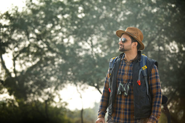 istock Male hiker admiring nature in forest 1363943883
