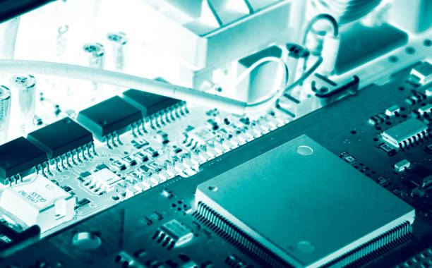 Electronic circuit board. Semiconductor motherboard circuit board technology. Mainboard of computer. Integrated semiconductor microchip on green circuit board. Hi-tech industry and computer science. placa de circuito electrónico. tecnología de placa de circuito de placa base de semiconductores. placa base de ordenador. microchip semiconductor integrado en placa de circuito verde. industria de alta tecnología y ciencias de la computación.