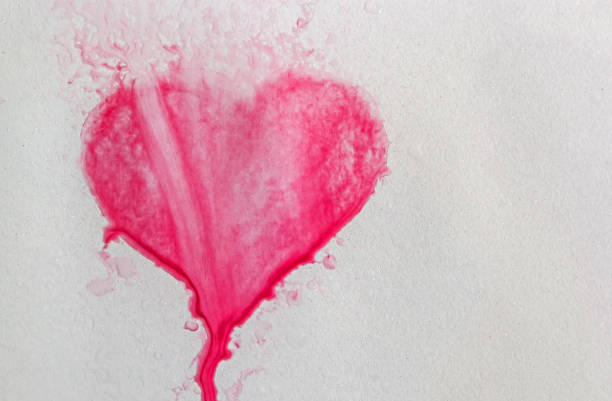 istock Watercolor hand painted red heart, paper texture 1363948073