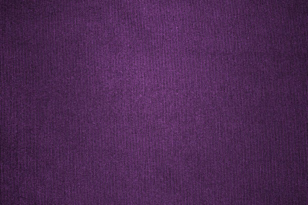 istock Dark purple woven fabric cloth with seamless rough grunge texture for background 1363950168