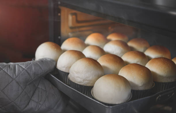 istock Home made baked round white breads. 1363951231