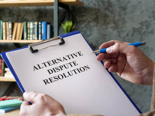 Man reads about alternative dispute resolution ADR.