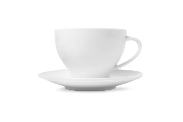 istock White tea cup and saucer for drink isolated on white background. Ceramic coffee cup or mug close up. Mock-up classic porcelain utensils. Blank ceramic mug mockup template for branding on white 1363952194