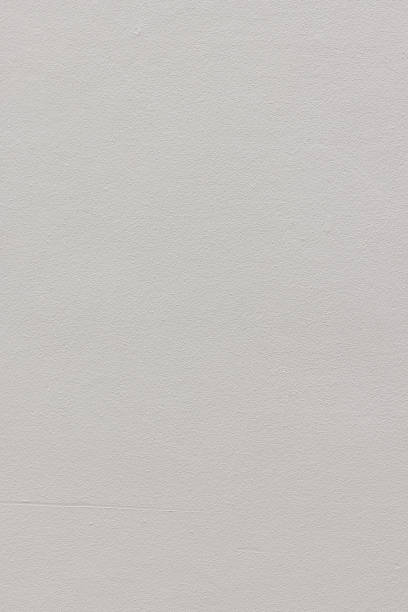 istock Part of a textured painted concrete wall 1363956997